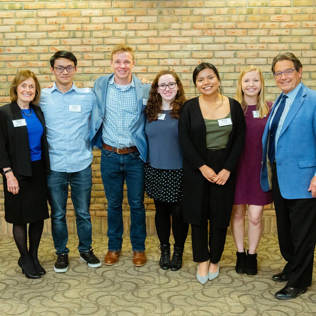Jim and Donna Brooks with students